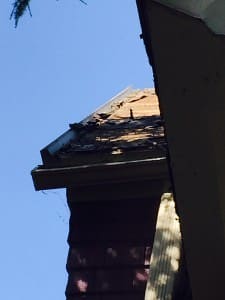 This trim sticks up over an inch and a half after all of the roofing has been stripped off.  In order to properly install a roof at this point, the trim is cut back and a piece of drip edge flashing can be installed to assure water doesn't get in.  If new drip edge flashing isn't installed, water will be diverted into the house.